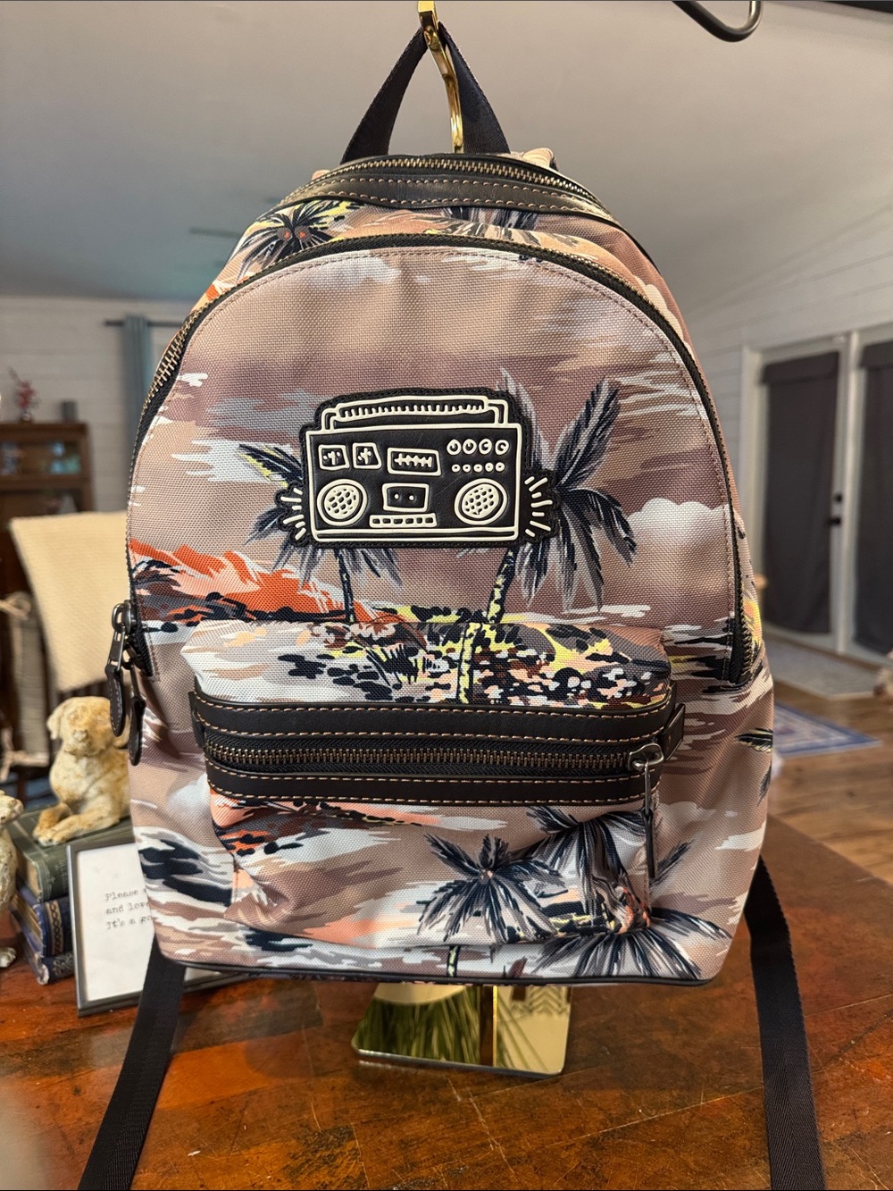 Coach x Keith Haring Men’s Tropical Print Backpack in Pink and Brown